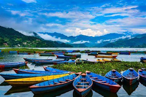 Phewa Lake with mountain reflections